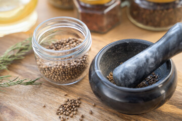 Black sesame seeds. Healthy sesame seeds in mortar.