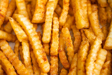 Yummy french fries as background