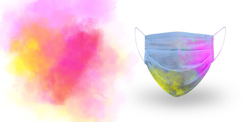 corona virus protective medical face mask in colorful smoke explosion Holi concept with copy space