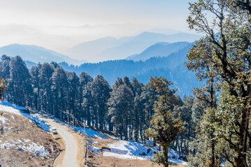 Fototapeta na wymiar Snow capped mountain ranges, Jalori Pass, Tirthan Valley, Himachal Pradesh, India