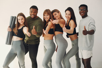 Sports group standing on a white background