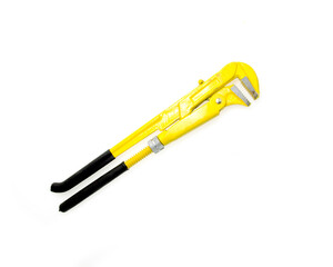 Yellow pipe wrench isolated on white background