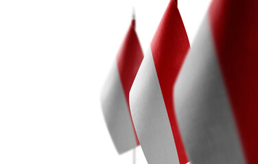 Small national flags of the Indonesia on a white background