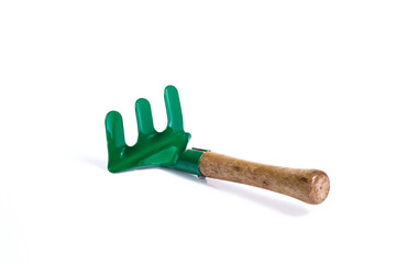 green fork garden tools isolated on white background