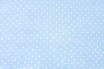 Polka dot blue fabric background and texture. Wallpaper, card, cover design and decor