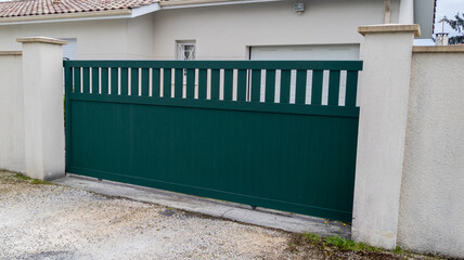 street slide portal suburb home green metal aluminum house gate access