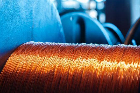 Copper wire reels in cable factory close up