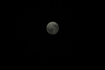 The moon in the night sky.