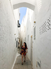 Girl walking in the streets of Hammamet in Tunisia