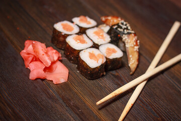 asian cuisine sushi rolls wooden sticks wasabi ginger seafood