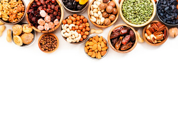 Nuts and dried fruits. Dried apricots, figs, prunes, raisins, cranberries, pecans, walnuts, pistachios, cashews, hazelnuts, almonds and other. Food background, top view