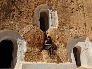 Girl posing in the caves of Matmata in Tunisia