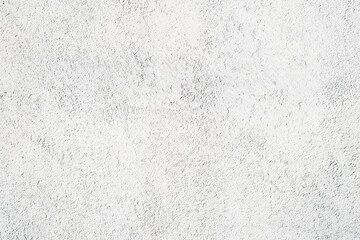 White wall, finishing decorative plaster for outdoor use, close-up. Relief texture background