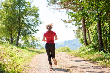 woman enjoying in a healthy lifestyle while jogging