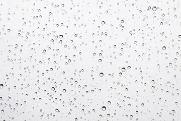 Water Drops Background. Macro view of icy rain drops on the window creating abstract geometric graphic shapes. Close Up