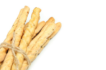 Tasty grissini breadsticks isolated on white background