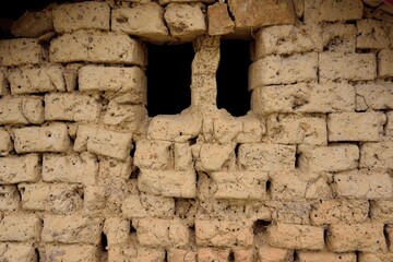The wall of a house covered with soil, in Taiwan.