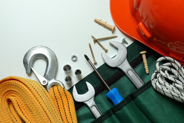 Concept of Labor Day with construction tools on white background
