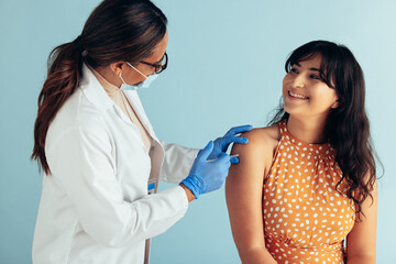 Pretty woman getting vaccination