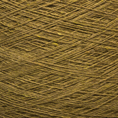 Colored yarn threads brown macro