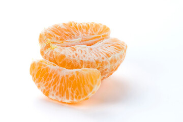 Close-up peeled oranges isolated on a white background