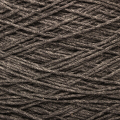 Colored yarn threads black macro