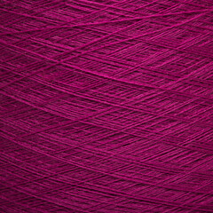 Colored yarn threads pink macro