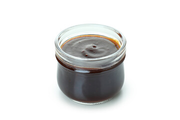 Glass jar of barbecue sauce isolated on white background