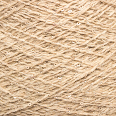 Colored yarn threads white macro