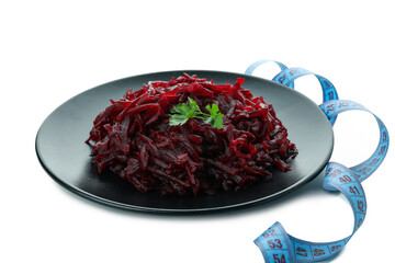 Plate with beet salad and measuring tape isolated on white background