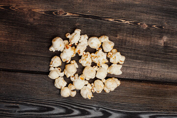 popcorn on a wooden table enjoyment rest meal