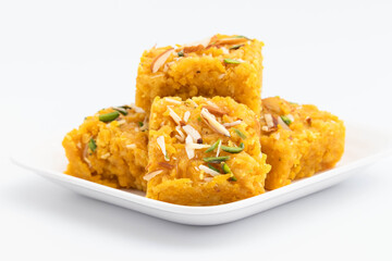 Sindhi Indian Mithai Sev Badam Halwa Burfi Barfee Or Barfi Is Made Of Bengal Gram Flour Besan Kaju Kesar Pista Khoya Meetha Doodh Mawa Malai In Desi Ghee. Isolated On White Background With Copy Space