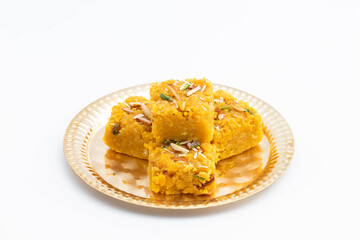 Sindhi Indian Mithai Sev Badam Halwa Burfi Barfee Or Barfi Is Made Of Bengal Gram Flour Besan Kaju Kesar Pista Khoya Meetha Doodh Mawa Malai In Desi Ghee. Isolated On White Background With Copy Space
