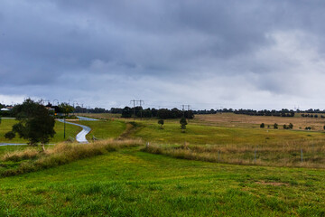 Back of a typical Australian suburb as it backs onto farmland with a walking path