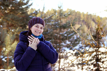 portrait of a woman in the winter forest 