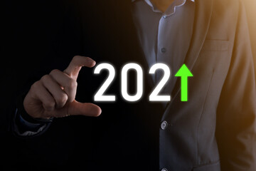 Plan business positive growth in year 2021 concept. Businessman plan and increase of positive indicators in his business, Growing up business concepts.