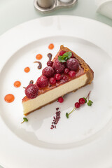Desserts on a white plate and a white background
