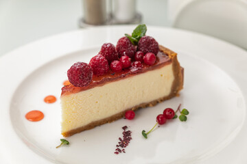 Desserts on a white plate and a white background
