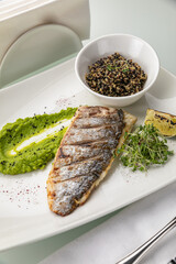 sea ​​bream grill on a plate
