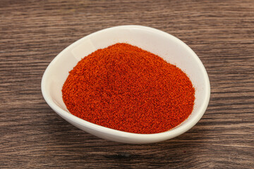 Dry paprika powder in the bowl