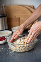 kneading dough with a woman's hands for homemade pie in the kitchen