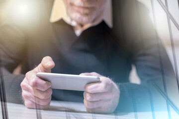 Man using his mobile phone; multiple exposure