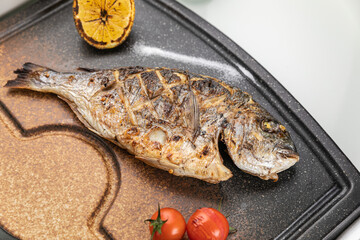 sea ​​bream grill on a plate
