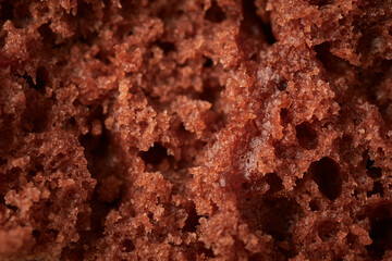 Food background half a chocolate cupcake, selective focus, close up