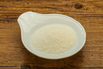 White sugar in the bowl