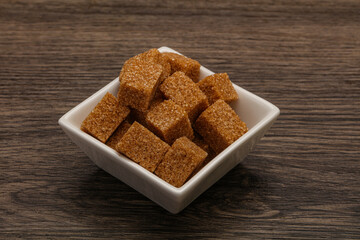 Cane sugar cubs in the bowl
