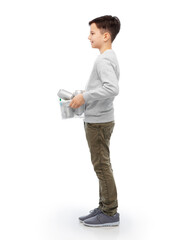 smiling boy sorting metallic waste