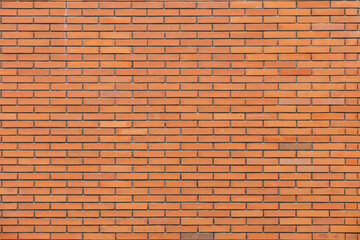 horizontal part of orange brick masonry wall