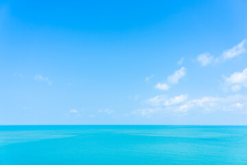 Beautiful high view tropical sea ocean with white cloud blue sky