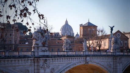St. Peter's cathedral and Tiber river at evening in Rome
